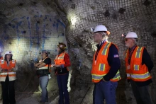 Kray Luxbacher and crowd at the San Xavier Underground Mining Laboratory